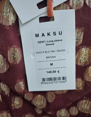 Blusa Maksu con estampado dorado