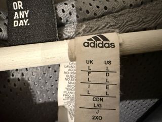 Chaqueta Adidas EXOS Windbreaker Gris Talla L