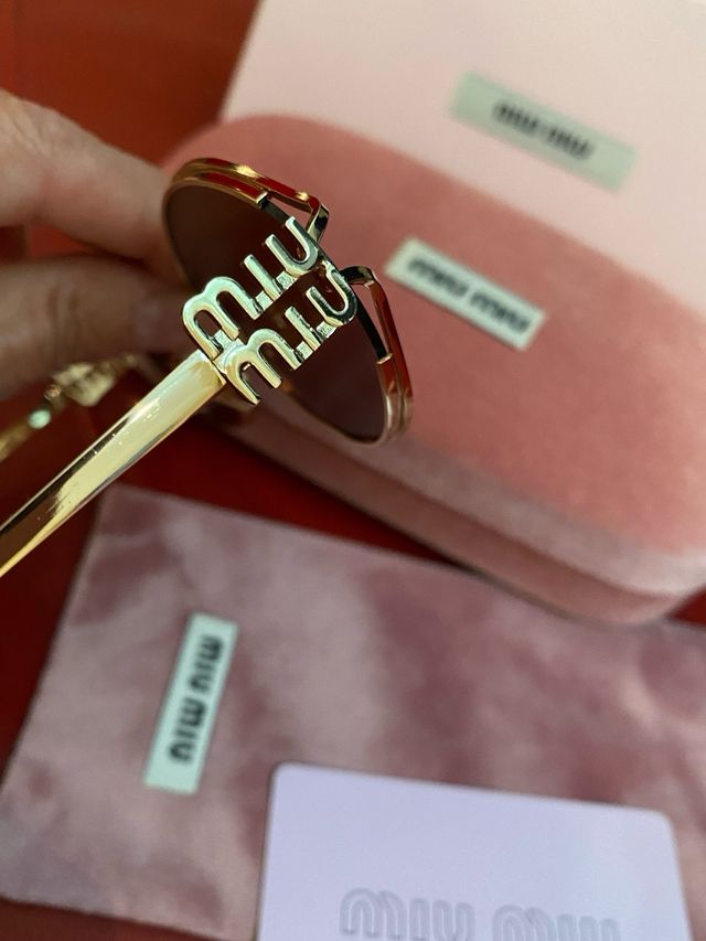 Occhiali da sole Miu Miu donna oro