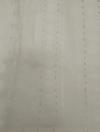 Top sin mangas con puntilla