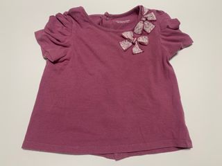 Camiseta rosa con lazos