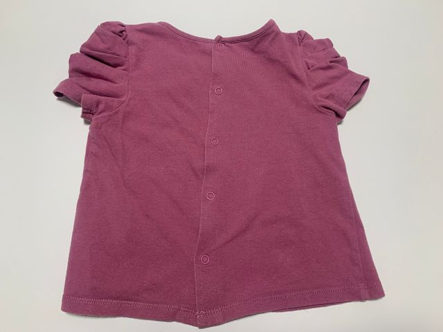 Camiseta rosa con lazos