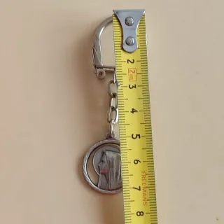 Llavero plateado con medalla de la Virgen o Madona