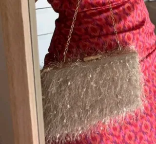 Bolso de fiesta dorado champagne con flecos