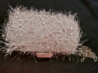 Bolso de fiesta dorado champagne con flecos