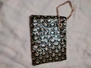 Bolso de fiesta lentejuelas negro y dorado