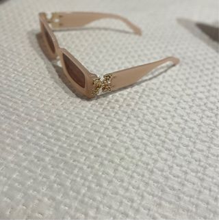 Occhiali da sole donna oro e rosa modello off w