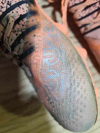 Botas de fútbol Puma Future Naranja/Negro