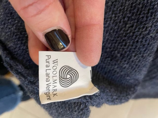 maglia lana con cappuccio e alamari