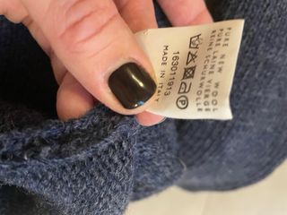 maglia lana con cappuccio e alamari