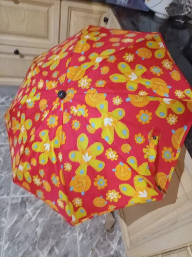 Sombrilla flores. PROTECCION RSYOS UVA