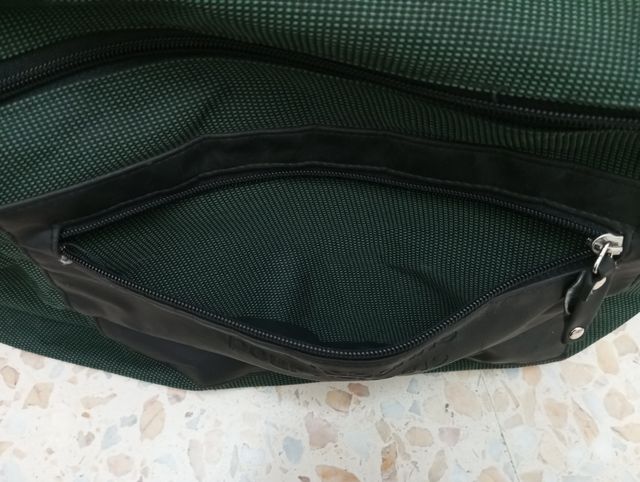 Bolsa de viaje Paco Rabanne verde y negra