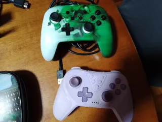 Nintendo Switch con juegos y mandos ,funda y caja