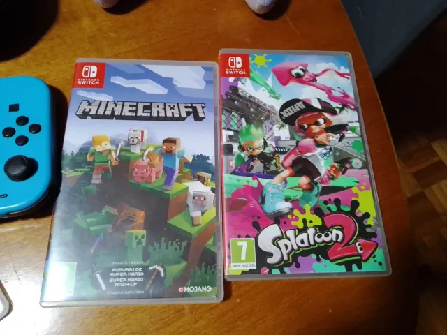 Nintendo Switch con juegos y mandos ,funda y caja