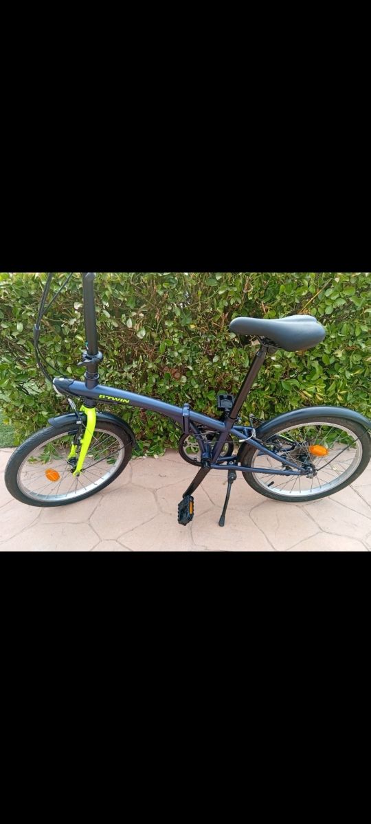 Bicicleta plegable Btwin azul y verde