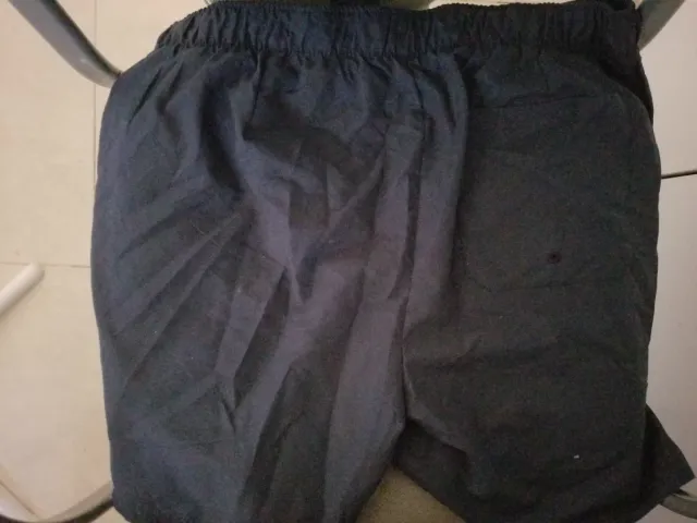 Pantalón corto deportivo azul y gris