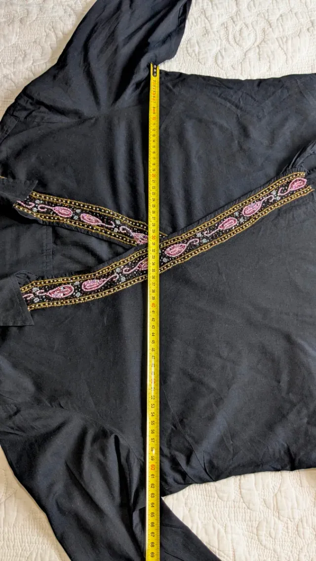 Blusa cruzada con pedrería