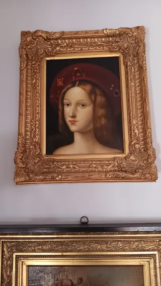 Dipinto con cornice dorata e rossa