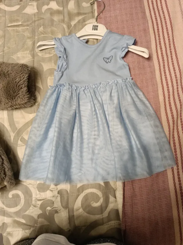 Vestito azzurro con farfalla