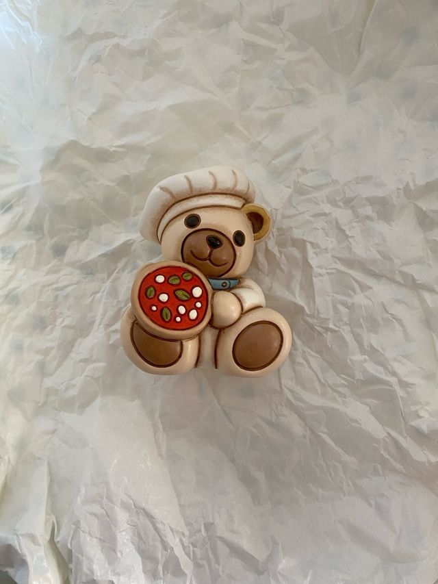 Orsetto Thuno chef con pizza