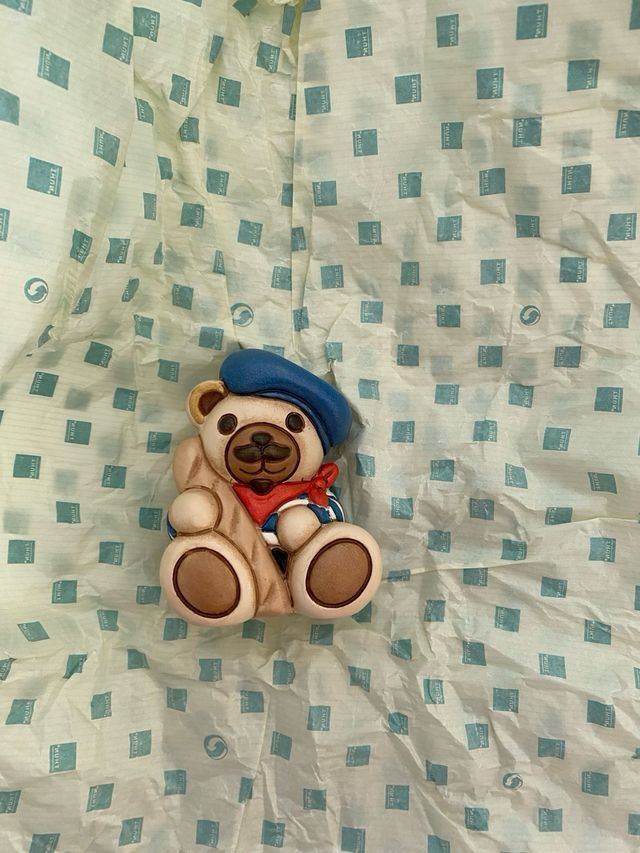 Orsetto Thuno chef con pizza