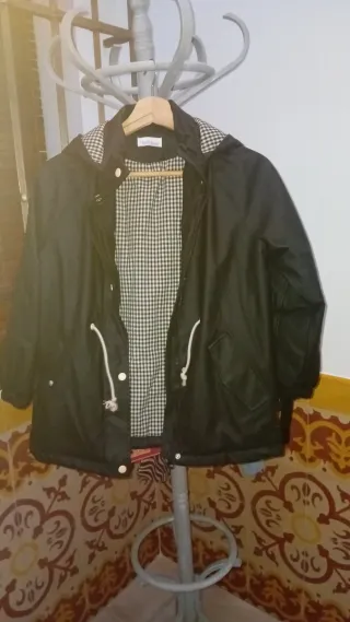 Chaqueta impermeable niña negra