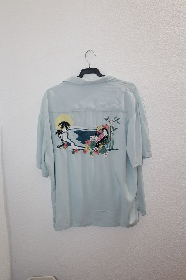 Camisa estampada tropical