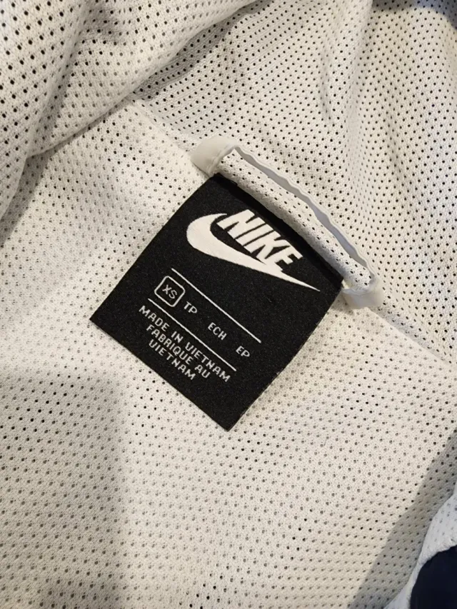 Chaqueta Cortavientos Nike Blanca y Azul