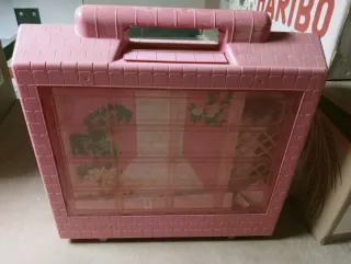 Casa de muñecas rosa maleta