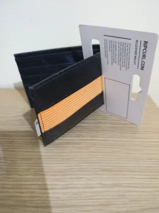 Cartera Rip Curl Negra y Amarilla