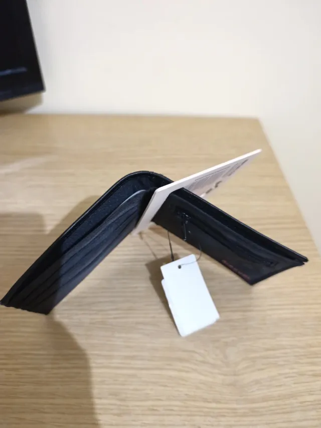 Cartera Rip Curl Negra y Amarilla