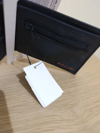 Cartera Rip Curl Negra y Amarilla