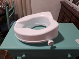 Elevador de inodoro blanco