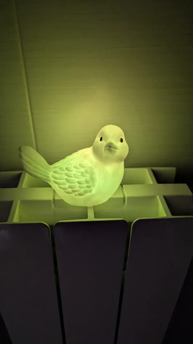 Lámpara pájaro cambia color