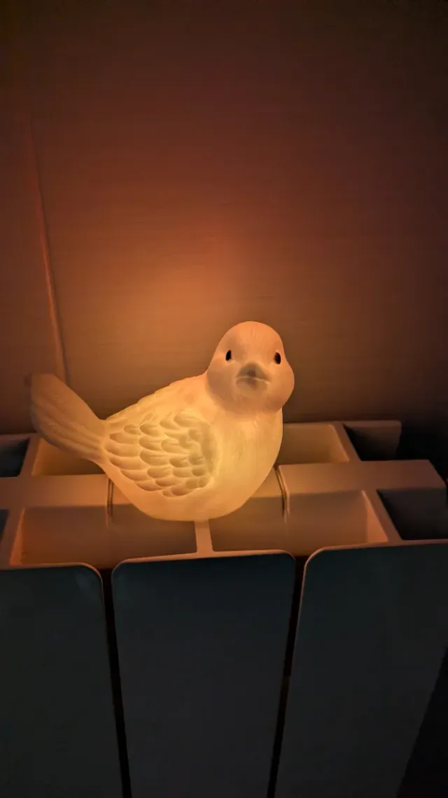 Lámpara pájaro cambia color