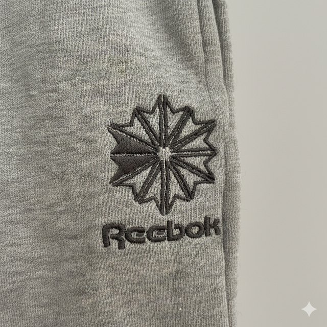 Pantalón chándal Reebok gris