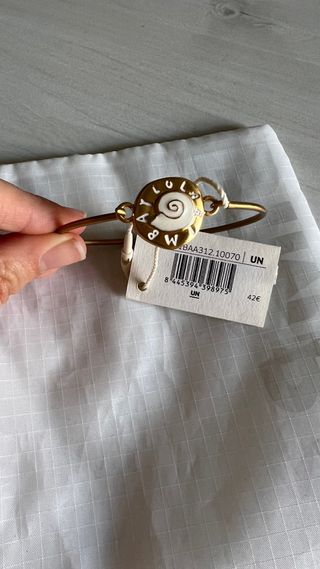 Pulsera Bimba y Lola dorada con blanco