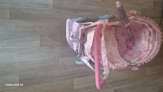 Carrito de juguete rosa para niña