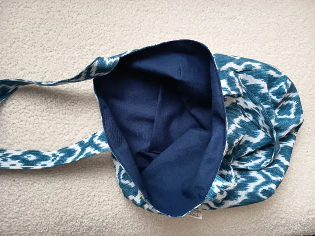 Bolsa y neceser verde acolchado