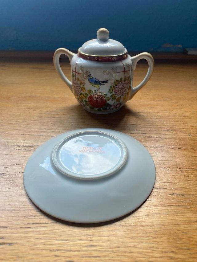 Juego de café de porcelana con pájaros