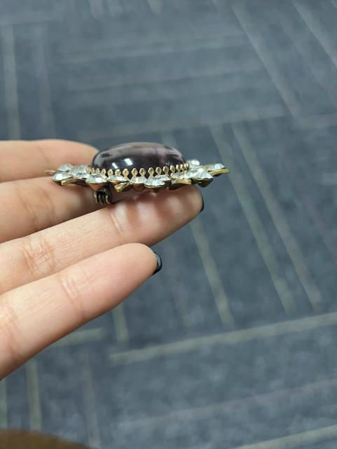 Broche sol con piedras