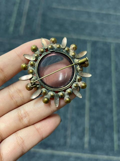 Broche sol con piedras