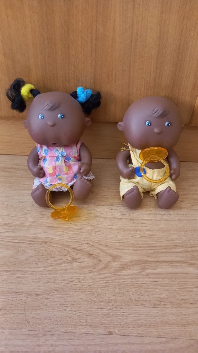Muñecos bebé con chupete
