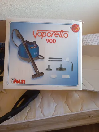 Vaporeta azul con accesorios