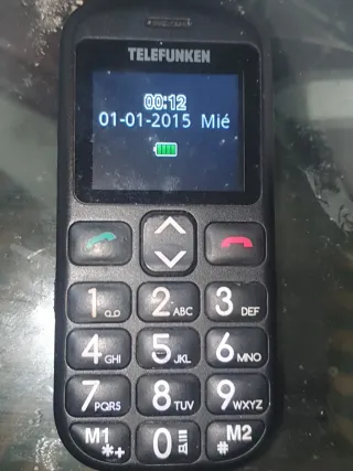 Lotes de teléfonos antiguos funcionando casi