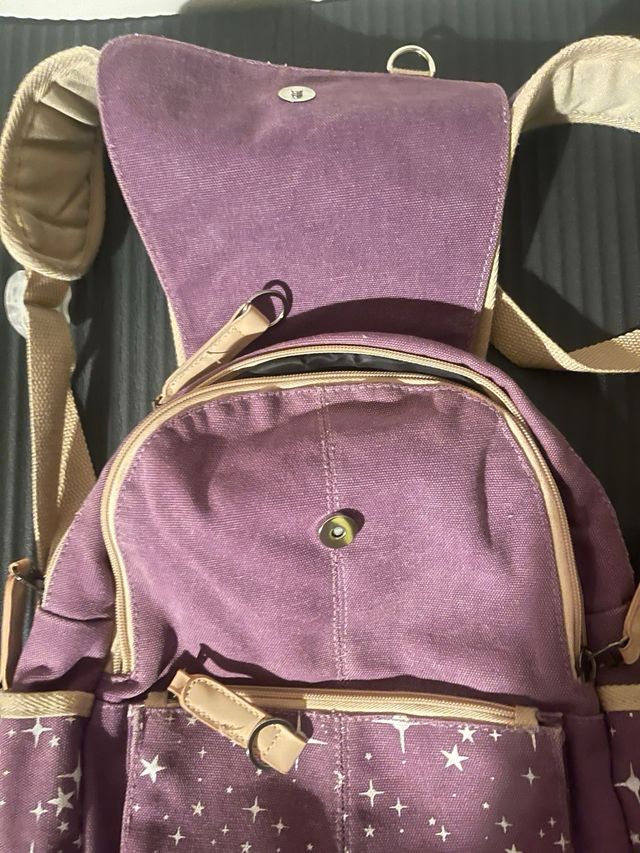 Zaino viola con stelle bianche