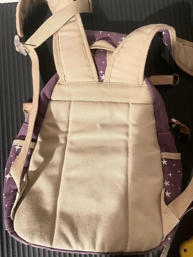 Zaino viola con stelle bianche