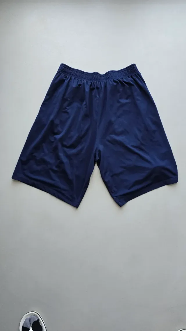 Pantaloncini da basket blu Macron