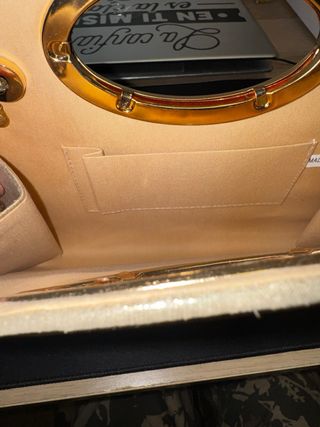 Bolso de fiesta dorado con cadena