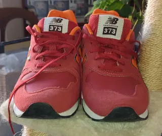 Scarpe New Balance 373 rosse e arancioni